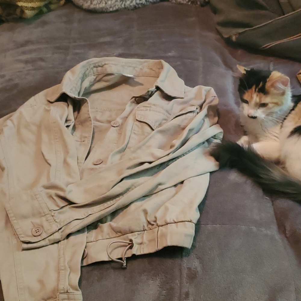 Tan jacket from no bounderies size medium